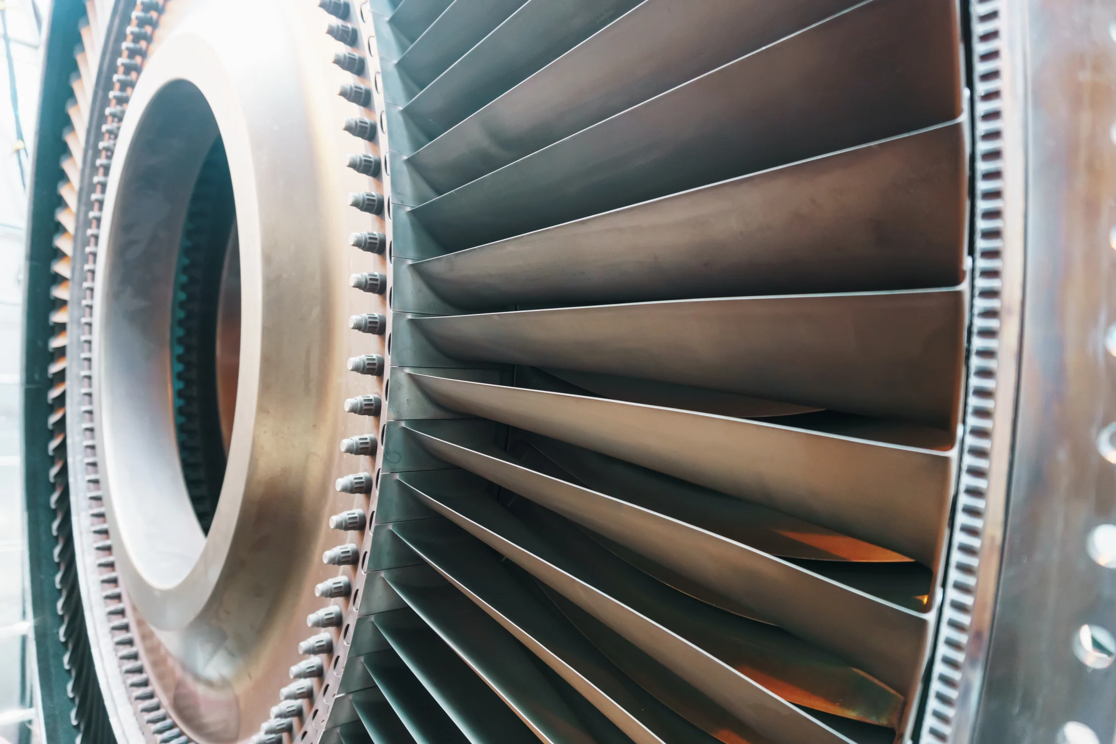 Blades of a gas turbine engine rotor disk used in power generation